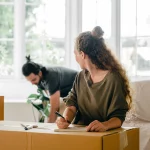 Two people preparing for a move